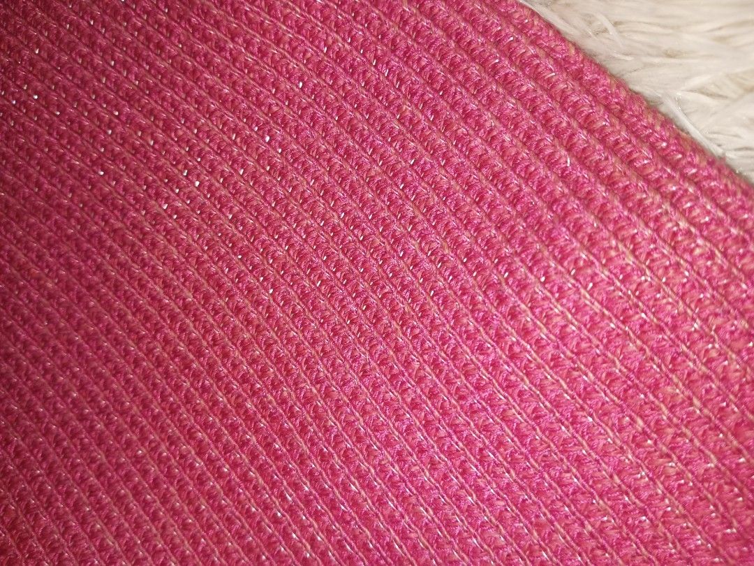 Pink Woven Tote Bag with Metal Studs (Category: Tote Bags) located in Quezon City. Submitted by cxthsells (Listing ID 1448817124, Image 2). Description: - Adorable pink woven tote bag - Features a sparkly thread woven into the material - Secure magnetic snap closure - Interior includes a zippered pocket and two slip pockets - Four metal studs on the bottom to protect the bag's base - Matching woven handles - Ideal for everyday use.