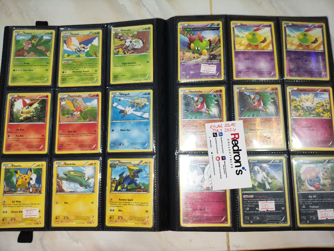 Pokemon Cards Collection XY Part 2 (Category: Raw Singles) located in Manila. Submitted by redron.dolarrylan (Listing ID 1448765377, Image 2). Description: - Assorted collection of Pokemon trading cards - Suitable for both collectors and players - All cards are stored securely in a binder - Some cards feature yellow price tags.
