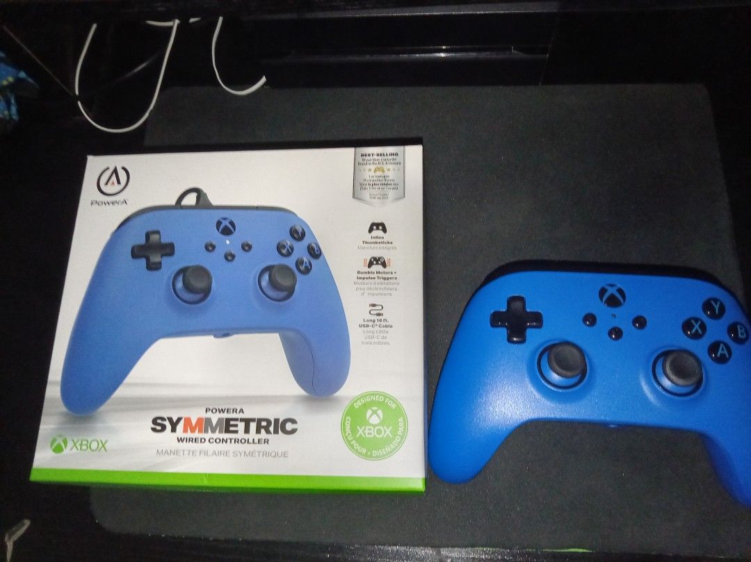 Xbox wired controller (Category: Controllers) located in Singapore. Submitted by uroemkia (Listing ID 1448743721, Image 1). Description: - Blue PowerA Symmetric wired controller for Xbox - Dual rumble motors & impulse triggers - Long 10 ft USB-C cable - Symmetrical thumbstick layout - Compatible with Xbox consoles & Windows PCs - Original box included -cash meetup -nego for fast deal pm my place -dilvery add 8$.