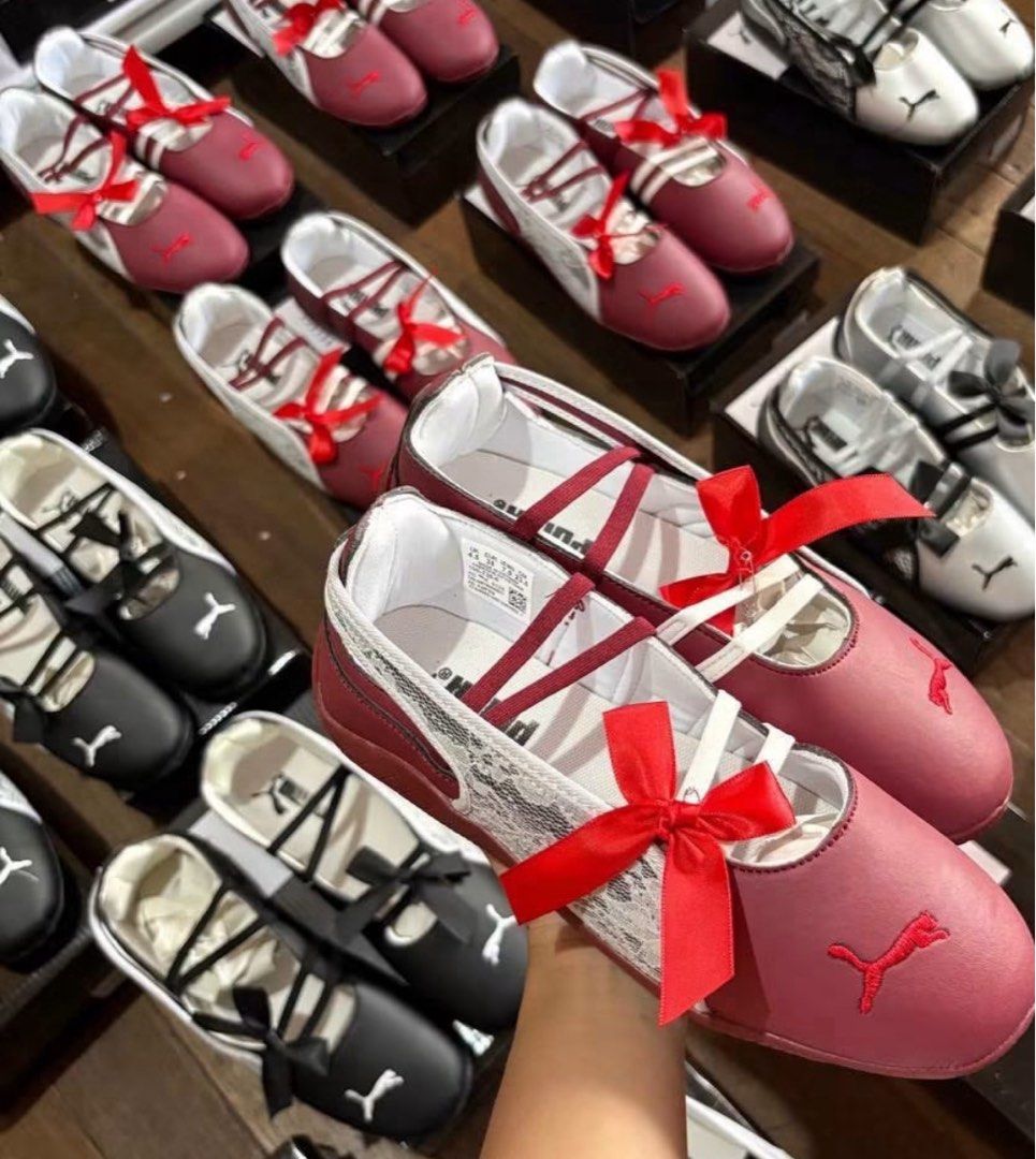 Puma Ballet Flats with Lace and Bows (Category: Flats & Sandals) located in Manila. Submitted by ww.whenworn (Listing ID 1448790236, Image 3). Description: - Available colors: Black and silver, Burgundy (silver lace), Cream (burgundy accents) - Features criss-cross straps and a bow detail - Versatile for casual or dressy occasions.