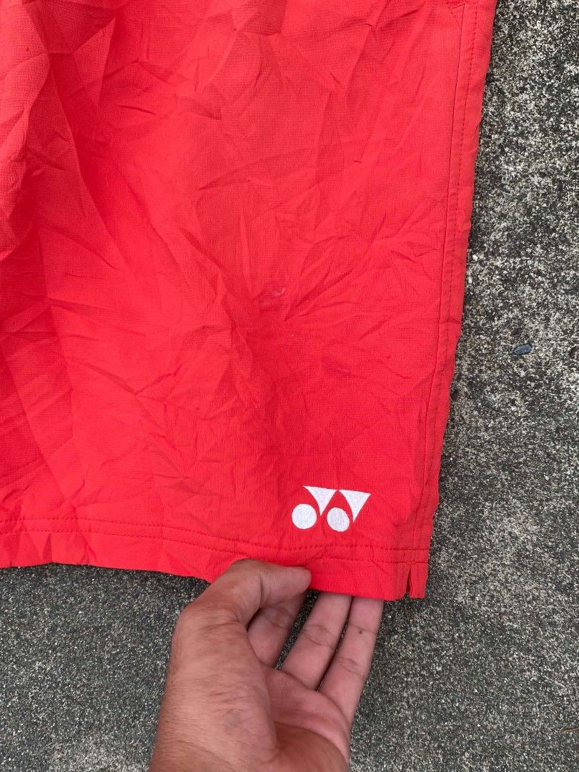 Red Yonex Badminton Shorts (Category: Activewear) located in Santiago. Submitted by thriftnimey03 (Listing ID 1448759226, Image 3). Description: - Brand: Yonex - Color: Red - Size: L - Ideal for: Badminton, sports - Features: Elastic waistband with drawstring, pockets - Condition: Good, no major flaws.