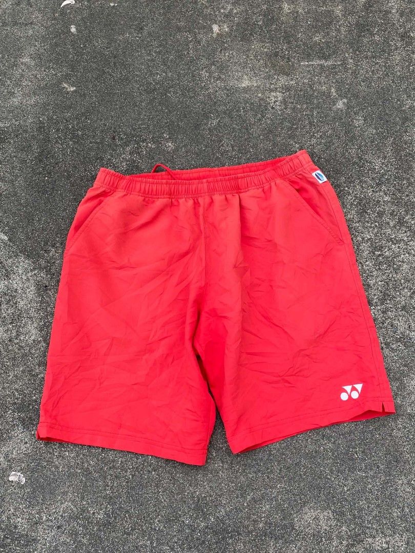 Red Yonex Badminton Shorts (Category: Activewear) located in Santiago. Submitted by thriftnimey03 (Listing ID 1448759226, Image 1). Description: - Brand: Yonex - Color: Red - Size: L - Ideal for: Badminton, sports - Features: Elastic waistband with drawstring, pockets - Condition: Good, no major flaws.
