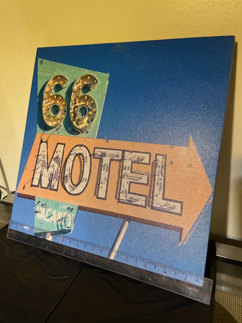 Route 66 Motel Lighted Canvas Wall Art (Category: Wall Decor) located in Quezon City. Submitted by romsr (Listing ID 1448739924, Image 2). Description: - Retro canvas art featuring a Route 66 Motel sign. - '66' has illuminated bulbs for a vintage, glowing effect. - Ideal for man caves, garages, or any space needing a classic Americana feel. - Comes ready to hang with a wooden frame on the back. - Adds a cool, nostalgic touch to your decor..