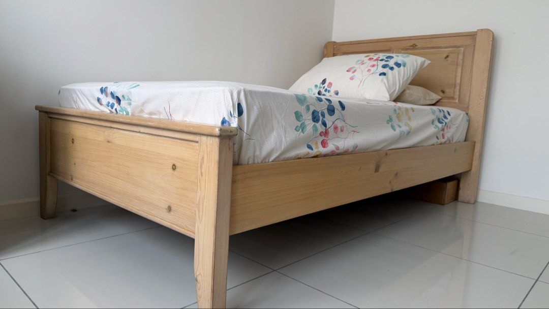 Solid Wood Super Single Bed (Category: Bed Frames & Mattresses) located in Petaling Jaya. Submitted by cocochutney (Listing ID 1448720477, Image 1). Description: - Solid wood super single bed frame - Natural wood finish - Sturdy and classic design - Includes headboard and footboard - Includes mattress - Ideal for children's or guest rooms - Ready for a new home.