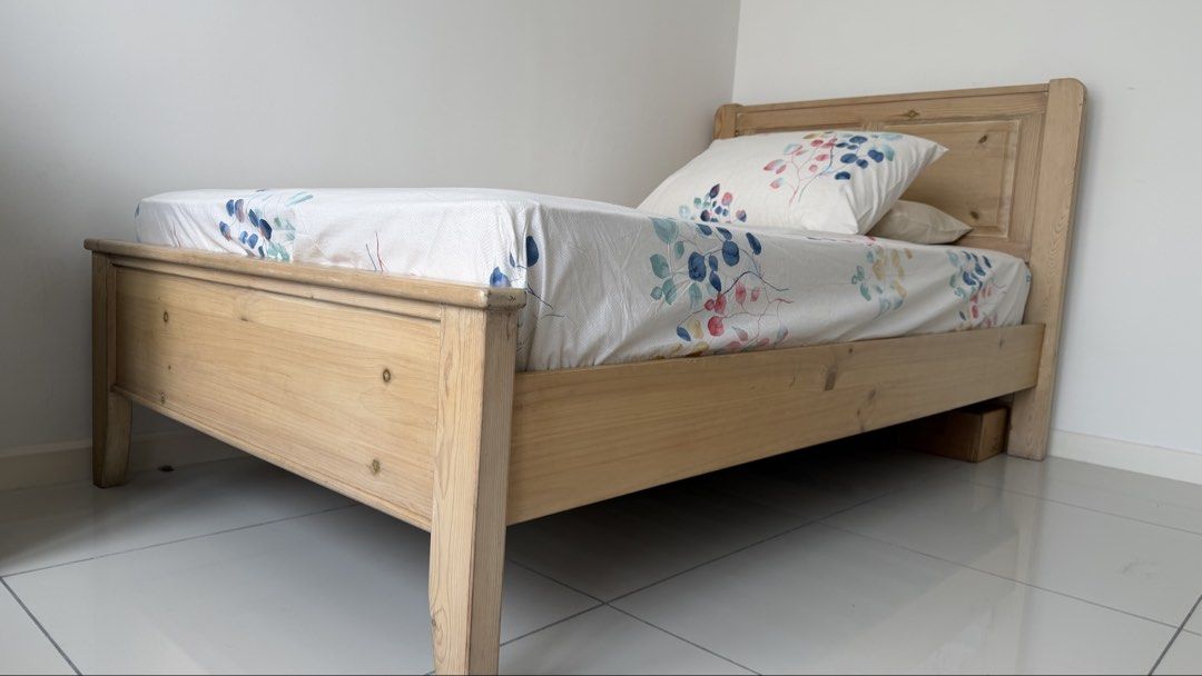 Solid Wood Super Single Bed (Category: Bed Frames & Mattresses) located in Petaling Jaya. Submitted by cocochutney (Listing ID 1448720477, Image 2). Description: - Solid wood super single bed frame - Natural wood finish - Sturdy and classic design - Includes headboard and footboard - Includes mattress - Ideal for children's or guest rooms - Ready for a new home.