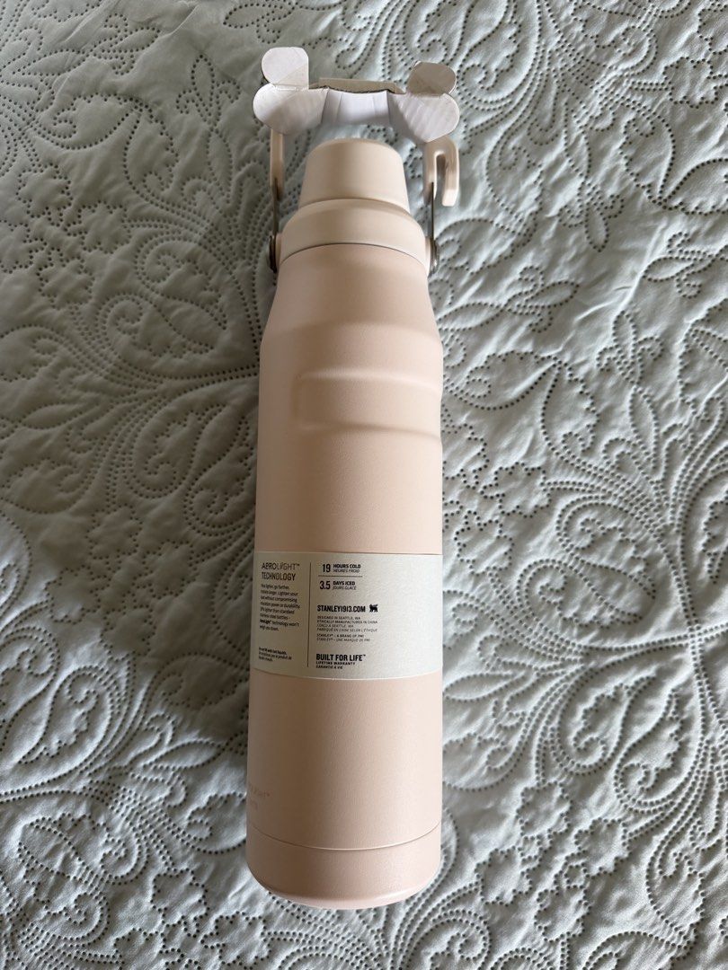 Stanley Iceflow Bottle (Category: Water Bottles & Tumblers) located in Paranaque City. Submitted by helloulou (Listing ID 1448718508, Image 2). Description: Brand: Stanley (Original) Style: Iceflow Bottle Color: Rose Quartz Size: 1.1L/ 36oz Material: Recycled 18/8 Stainless Steel; Leakproof Fast Flow Lid; Easy Carry Handle with Cap Holder; BPA Free; Dishwasher Safe; Double Wall Vacuum Insulation Aerolight Technology: Pack lighter, go farther, hyd