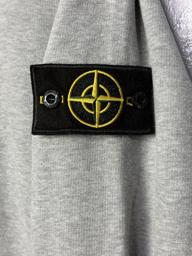 Stone Island Sweatshirt Grey Cotton (Category: Coats, Jackets and Outerwear) located in Manila. Submitted by dipdrip (Listing ID 1448828028, Image 3). Description: - Grey Stone Island Sweatshirt - Made in Turkey - 100% Cotton - Care: Machine wash cold (mild process), do not bleach, iron max 110°C, dry cleanable. Refer to tags for full details. DIMENSIONS Width : 23.5 Length : 28 Shoulder : 20.5 Sleeve : 28 Condition In excellent condition 2,000ph
