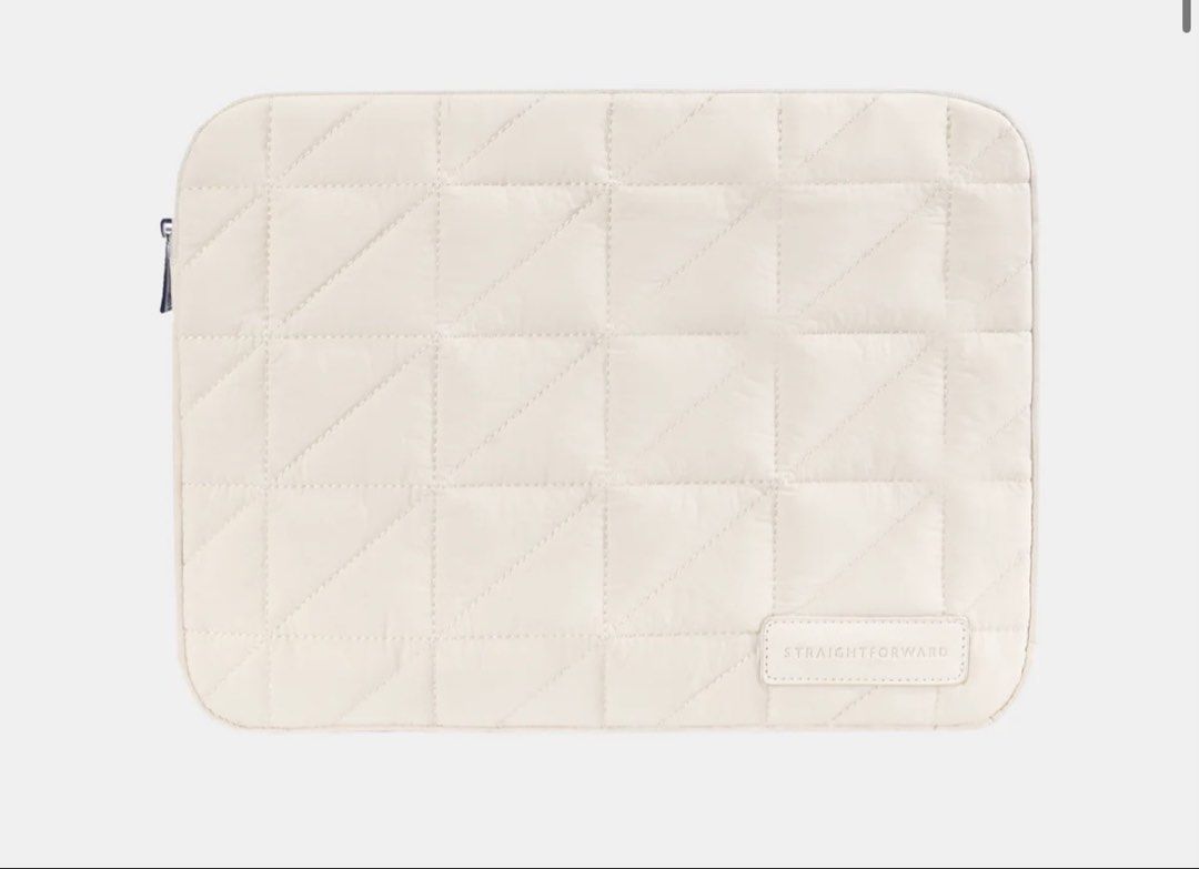 STRAIGHTFORWARD Quilted Laptop Sleeve Pouch Bag (Category: Laptop Bags & Sleeves) located in Paranaque City. Submitted by craftsy. (Listing ID 1448837524, Image 2). Description: - Quilted laptop sleeve from STRAIGHTFORWARD - Neutral beige color - Padded for excellent protection - Secure zipper closure - Fits most standard laptops - Ideal for everyday use and travel - Keep your device safe and stylish 14 Inch.