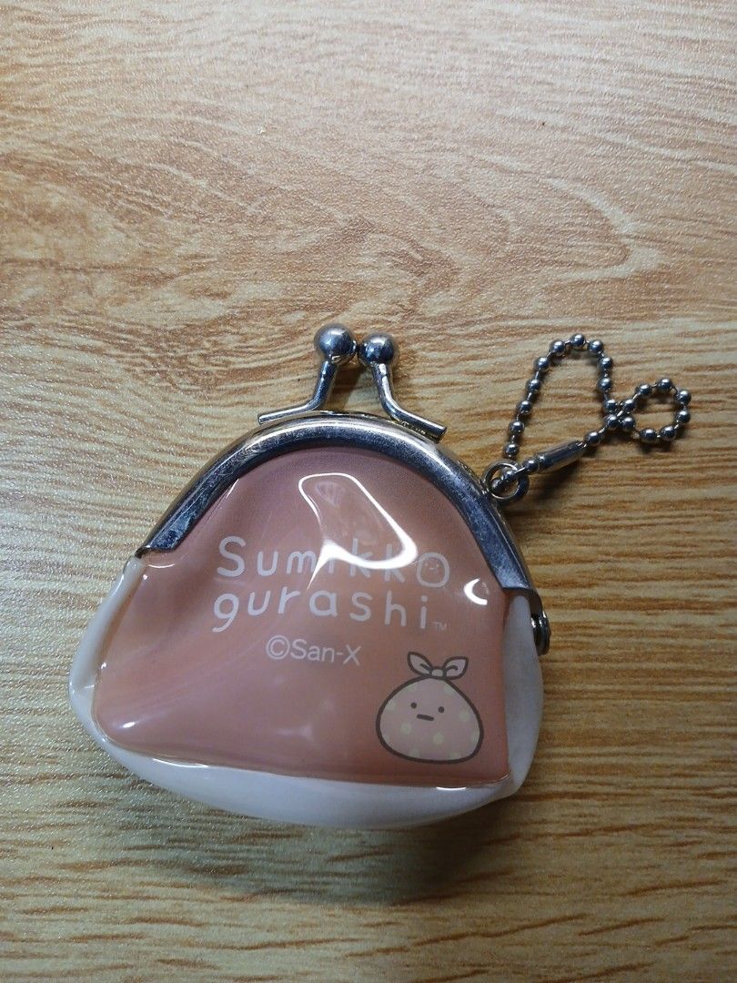 Sumikko kisslip keychain (Category: Character Goods) located in Manila. Submitted by nicolee_jelly (Listing ID 1448838845, Image 2). Description: - Adorable Sumikko Gurashi keychain - Features a kisslip coin purse design - Perfect for decorating bags, backpacks, or keys - Cute and collectible accessory.