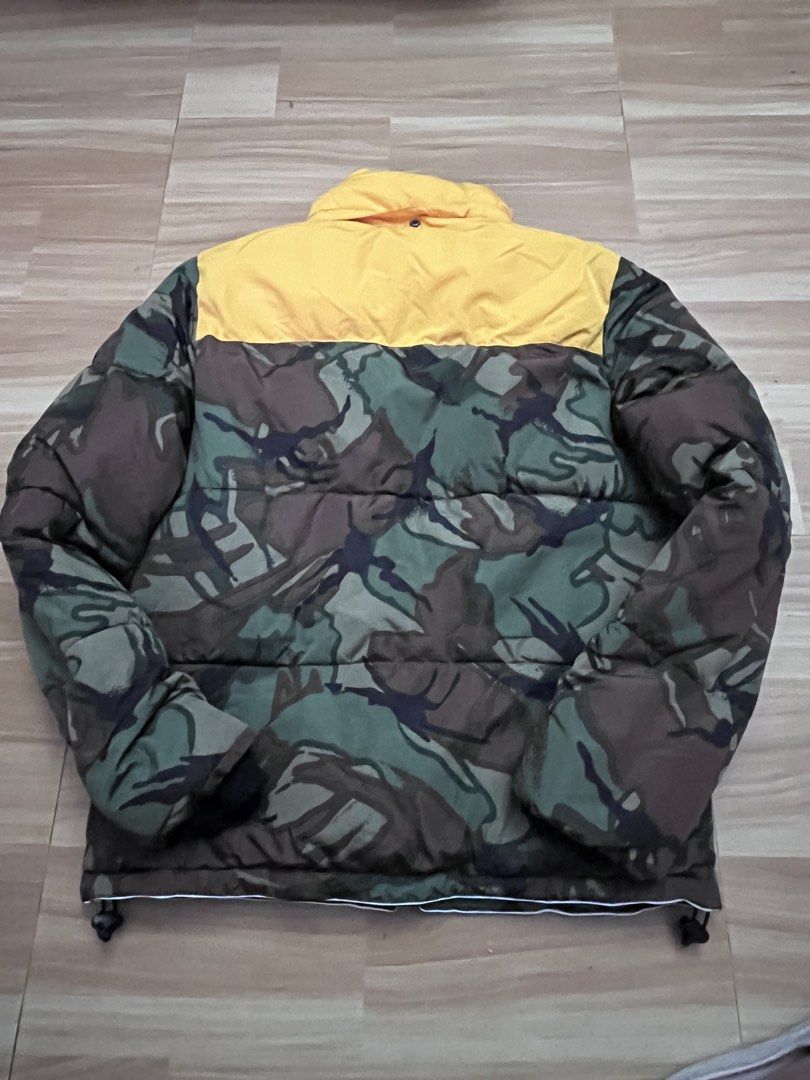 Superdry MNTN Squad Camo Puffer Jacket Yellow Hood (Category: Coats, Jackets and Outerwear) located in Victorias. Submitted by lan1877 (Listing ID 1448891982, Image 2). Description: - Superdry camo puffer jacket - Yellow upper section with sherpa-lined collar - MNTN Squad patch on chest and back - Zipper closure with pockets - Drawstring hem Good as new Size XL on tag 23W 27L dimension Issue missing hood 1800 plus sf - Made in China.
