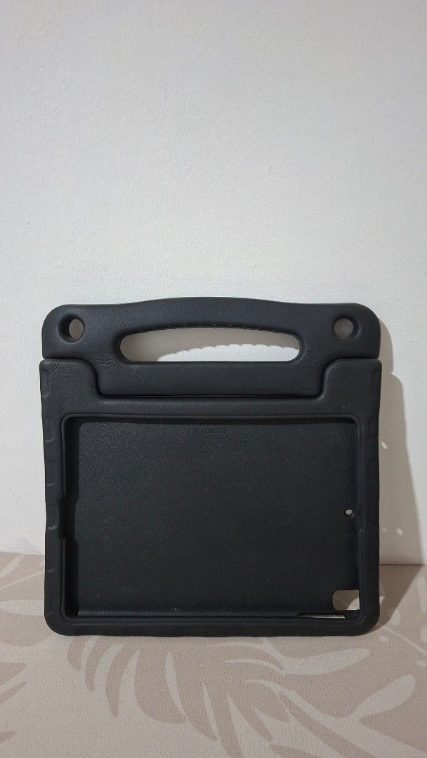 Tablet Cover/Stand for iPad 7th gen and aimilar sized tablets (Category: Other Accessories) located in Imus. Submitted by pick_and_dig (Listing ID 1448782709, Image 1). Description: - SALE! Old price: P200 Sale price: P100 -Specifically designed for iPad 7th generation and similar sized tablets - Features a built-in, easy-grip handle for portability. - Doubles as a convenient stand for viewing. - Provides robust protection against drops and impac