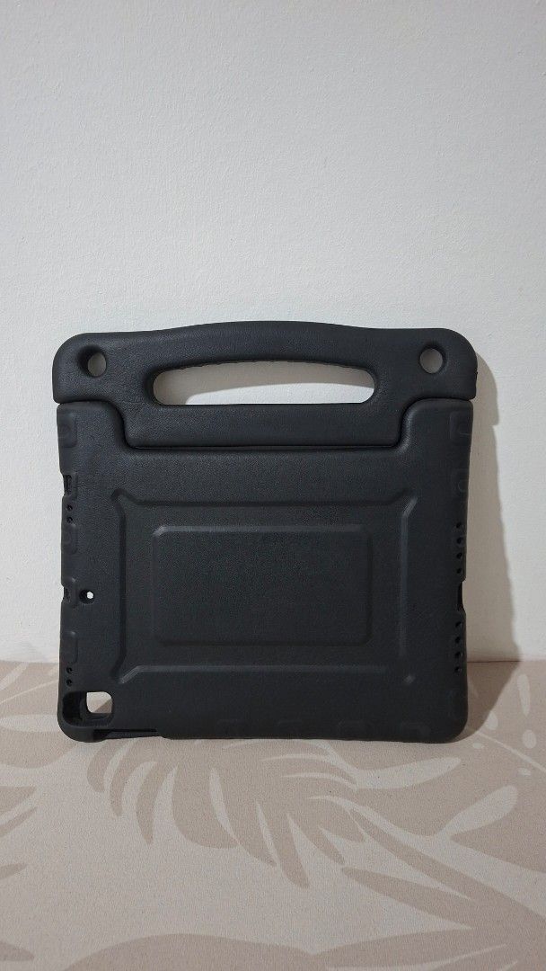 Tablet Cover/Stand for iPad 7th gen and aimilar sized tablets (Category: Other Accessories) located in Imus. Submitted by pick_and_dig (Listing ID 1448782709, Image 2). Description: - SALE! Old price: P200 Sale price: P100 -Specifically designed for iPad 7th generation and similar sized tablets - Features a built-in, easy-grip handle for portability. - Doubles as a convenient stand for viewing. - Provides robust protection against drops and impac