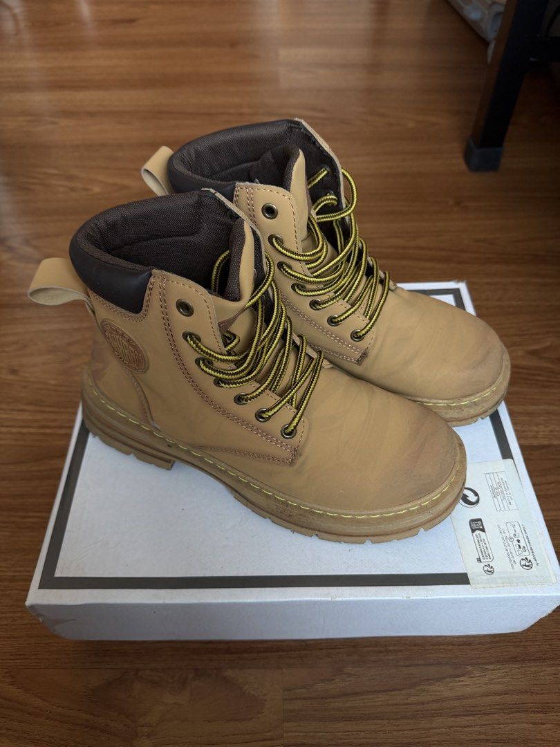 Tan Timberland-style Lace-up Work Boots (Category: Boots) located in Makati City. Submitted by thhird (Listing ID 1448758090, Image 3). Description: - Bought from Shein - Classic tan work boots with yellow laces, inspired by Timberland style. - Fits Men US 7.5-8.