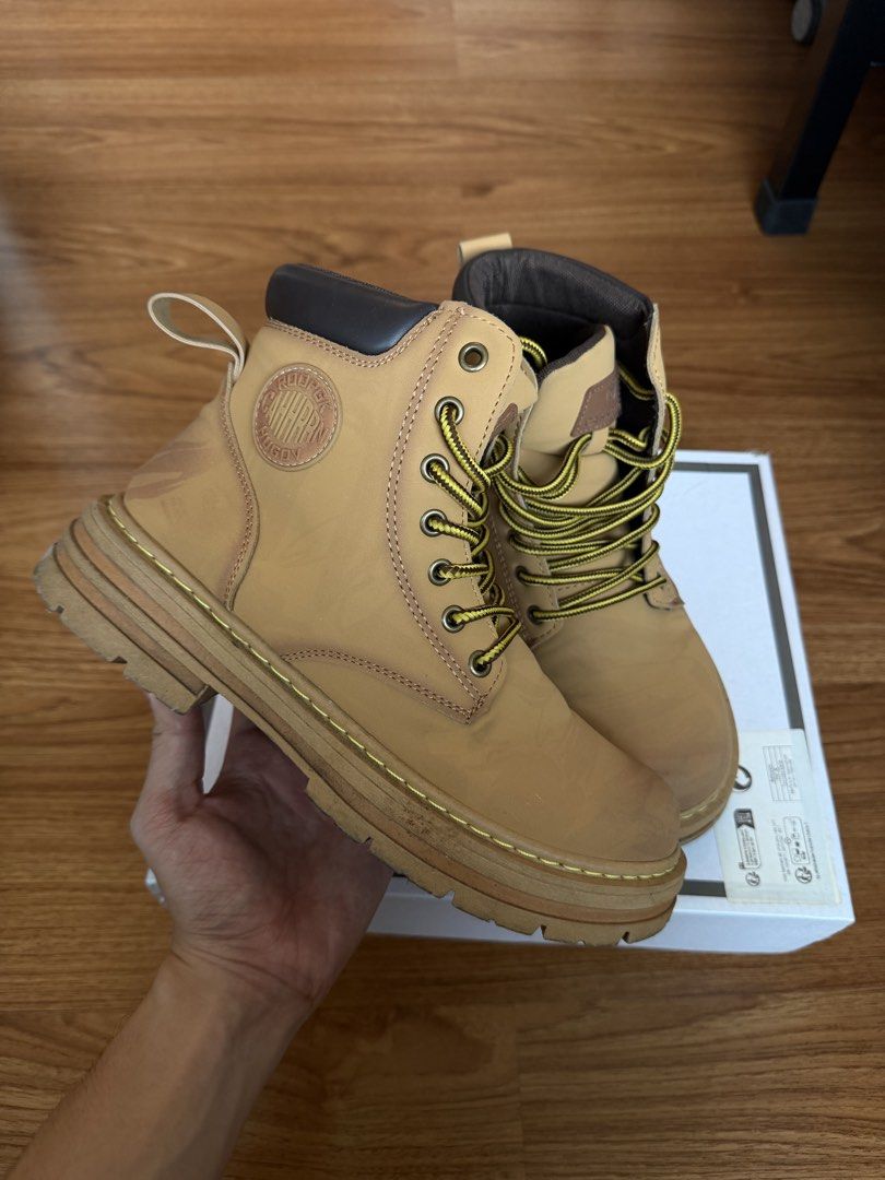 Tan Timberland-style Lace-up Work Boots (Category: Boots) located in Makati City. Submitted by thhird (Listing ID 1448758090, Image 1). Description: - Bought from Shein - Classic tan work boots with yellow laces, inspired by Timberland style. - Fits Men US 7.5-8.