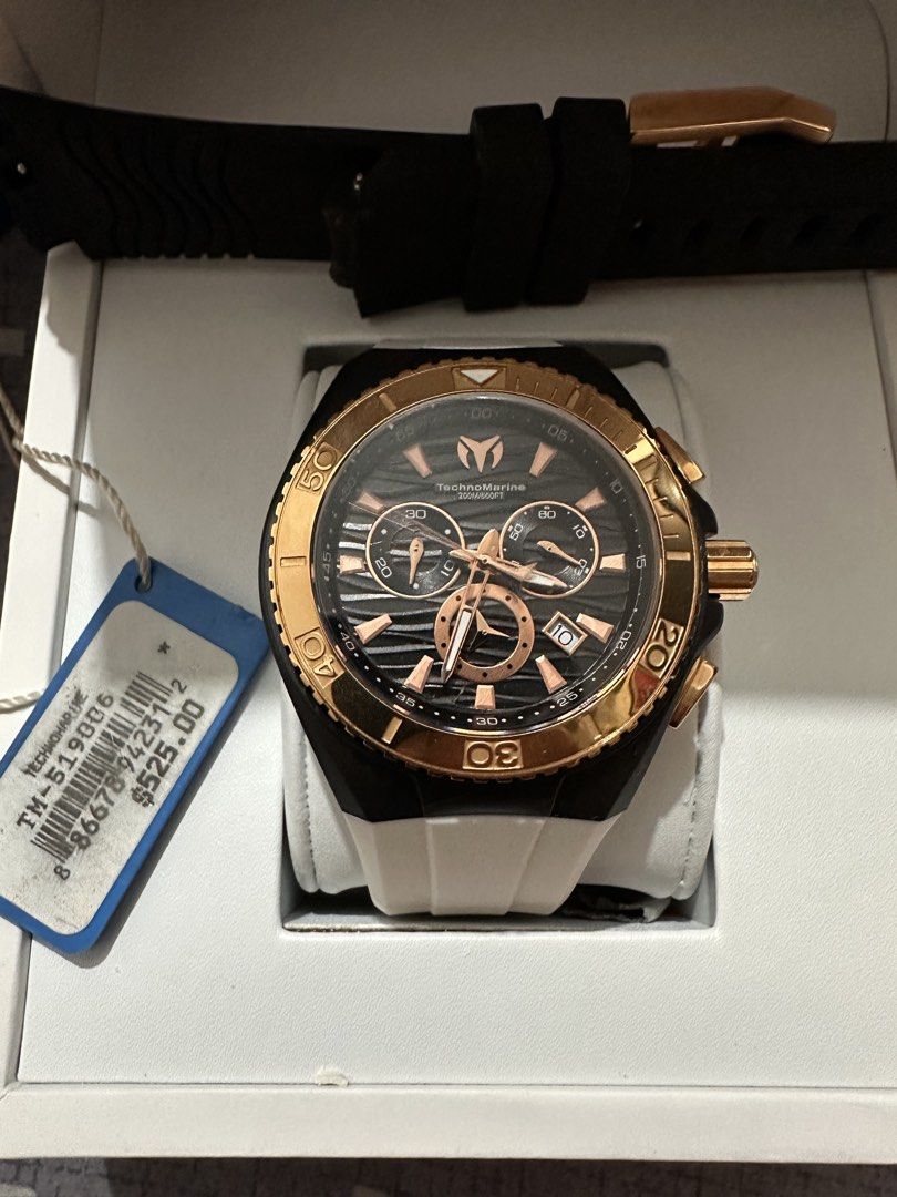 TechnoMarine Chronograph Watch Rose Gold Black White (Category: Women's Watches) located in Angono. Submitted by kiba_inuzuka (Listing ID 1448768524, Image 1). Description: - TechnoMarine Chronograph Watch - Rose gold accents on black dial - Black bezel - White strap (plus extra black strap included) - Original box included - Original price tag: $525.00 - Ideal for diving and everyday wear.