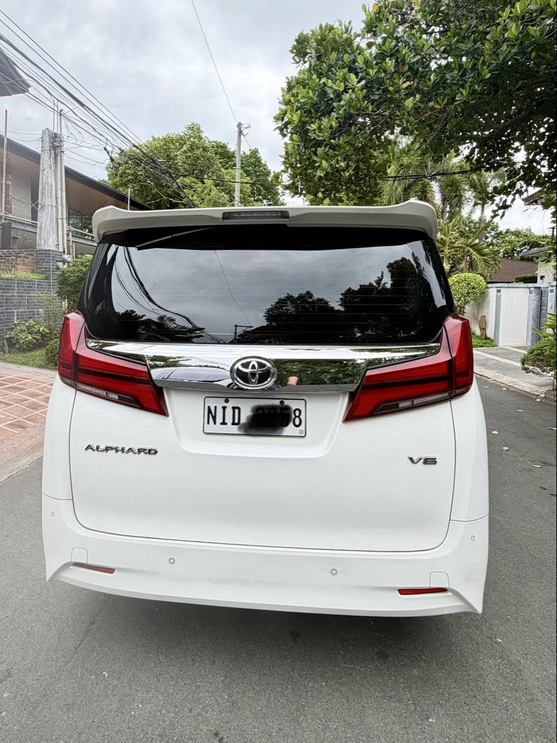 Toyota Alphard 3.5 GF 7-Seater (A) (Category: Used Cars) located in Manila. Submitted by queenbee.2025 (Listing ID 1448722575, Image 3). Description: Reason for Selling: Replacing for Hybrid Alphard Reason for high mileage used as school service Alabang to BGC Features ✅ Luxurious captain seats with power adjustment ✅ Spacious 7-seater configuration ✅ Premium leather upholstery ✅ Rear climate controls ✅ Elegant wood trim interior ✅ Dark tint ✅ Sm