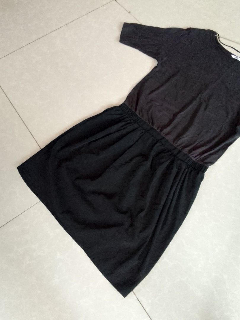 Uniqlo Black Dress (Category: Dresses) located in Davao. Submitted by declutter-ecothings (Listing ID 1448717762, Image 3). Description: Uniqlo cotton fabric light black top, suede dark black bottom elastic waist. In good condition. No flaws.