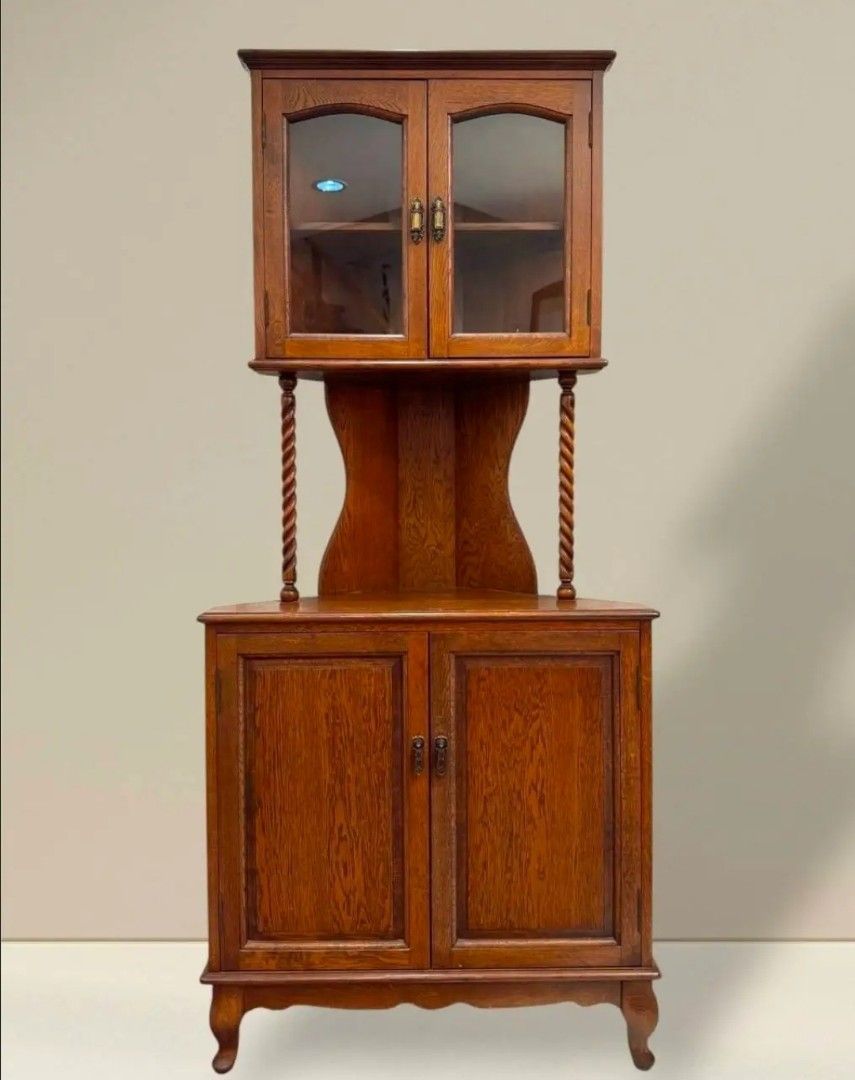Vintage Corner Display Cabinet (Category: Shelves, Cabinets & Racks) located in Quezon City. Submitted by dannikkishoppe2 (Listing ID 1448776305, Image 1). Description: Vintage Corner Display Cabinet ₱9500‼️ Perfect for displaying fancy plates, teacups, or cherished collectibles Space saving piece designed to sit neatly in a corner and this is a great way to make the most of that space L31 x W16 x H69.8 inches Solid wood, plywood, decorative boar
