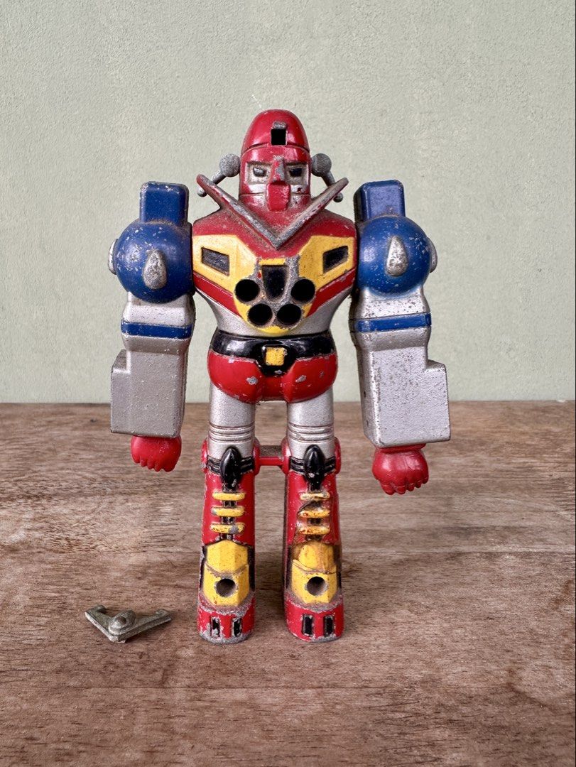 Vintage Mekanda Robot Figure/Toy (Category: Figurines & Statues) located in Mandaluyong City. Submitted by collectorsobsessions (Listing ID 1403834395, Image 1). Description: - Not in Mint or Excellent condition. - Left leg has tape on it. - Right arm is semi-loose and left arm is semi-tight. - Front horn/antenna is loose and falls off when you try to insert it in Mekanda's forehead. - Missing accessories. - Comes as is, what you see is what you 