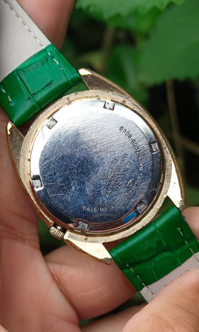 VINTAGE SEIKO " GREEN LINEN DIAL" (Category: Luxury Watches) located in Manila. Submitted by arcads97 (Listing ID 1448810808, Image 2). Description: Selling Vintage seiko 5 "Green Dial" -Ref:7009-8088 -January 1986 -Automatic -Green Dial -Gold Tone Case -AM green straps -Day/Date Display -Newly installed dome Glass -Newly Serviced Note: this is a vintage preloved watch. Please manage your expectations Loc: Diliman Quezon City.