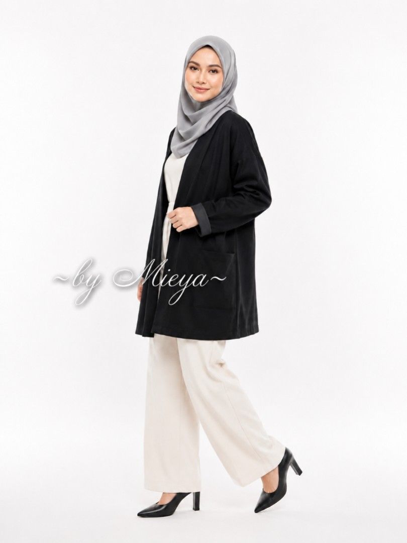 Zara Basic Black Open Front Jacket (Category: Coats, Jackets and Outerwear) located in Bangi. Submitted by mieya1604 (Listing ID 1447884342, Image 1). Description: - Zara Basic black open front jacket - Three-quarter sleeves with rolled cuffs - Two front pockets - Simple and versatile for layering over tops or dresses.
