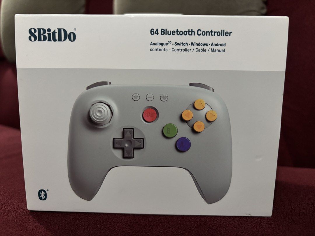 8BitDo 64 Bluetooth Controller (Category: Controllers) located in Manila. Submitted by dondz (Listing ID 1449069928, Image 1). Description: - 8BitDo 64 Bluetooth Controller - Compatible with: Analogue, Nintendo Switch, Windows, Android - Includes: Controller, USB cable, Manual - All items in original packaging - Ideal for retro gaming enthusiasts.