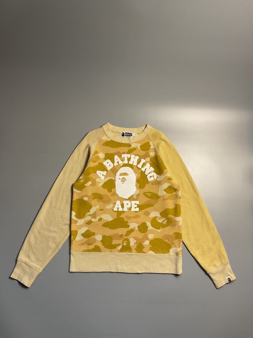 ABC camo (Category: Coats, Jackets and Outerwear) located in San Pablo. Submitted by pj_thrifthings (Listing ID 1449055634, Image 1). Description: This yellow A Bathing Ape Color Camo College Crewneck features a prominent large graphic print on the front. Authentic Guaranteed Small on tag Width - 18.5 Length - 26 Asnew condition Flawless Can do shipping nationwide. .