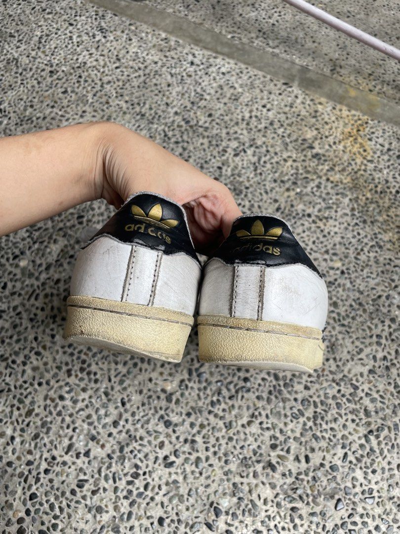 Adidas Superstar Sneakers White Black (Category: Sneakers) located in Manila. Submitted by coollion_7aaba1 (Listing ID 1449083828, Image 2). Description: * Classic Adidas Superstar sneakers * Size 38 * Personally bought in Japan * Guaranteed no issues, just well-used with normal signs of wear.