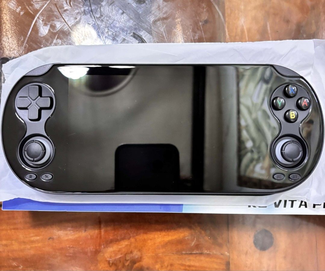 Anbernic RG VITA Pro Handheld Game Console (Category: Others) located in Quezon City. Submitted by riri_24 (Listing ID 1449015208, Image 3). Description: - Anbernic RG VITA Pro handheld gaming device - Comes with console and charging cable - Original box and cable charger included - with sd card - Ready for retro gaming adventures!.