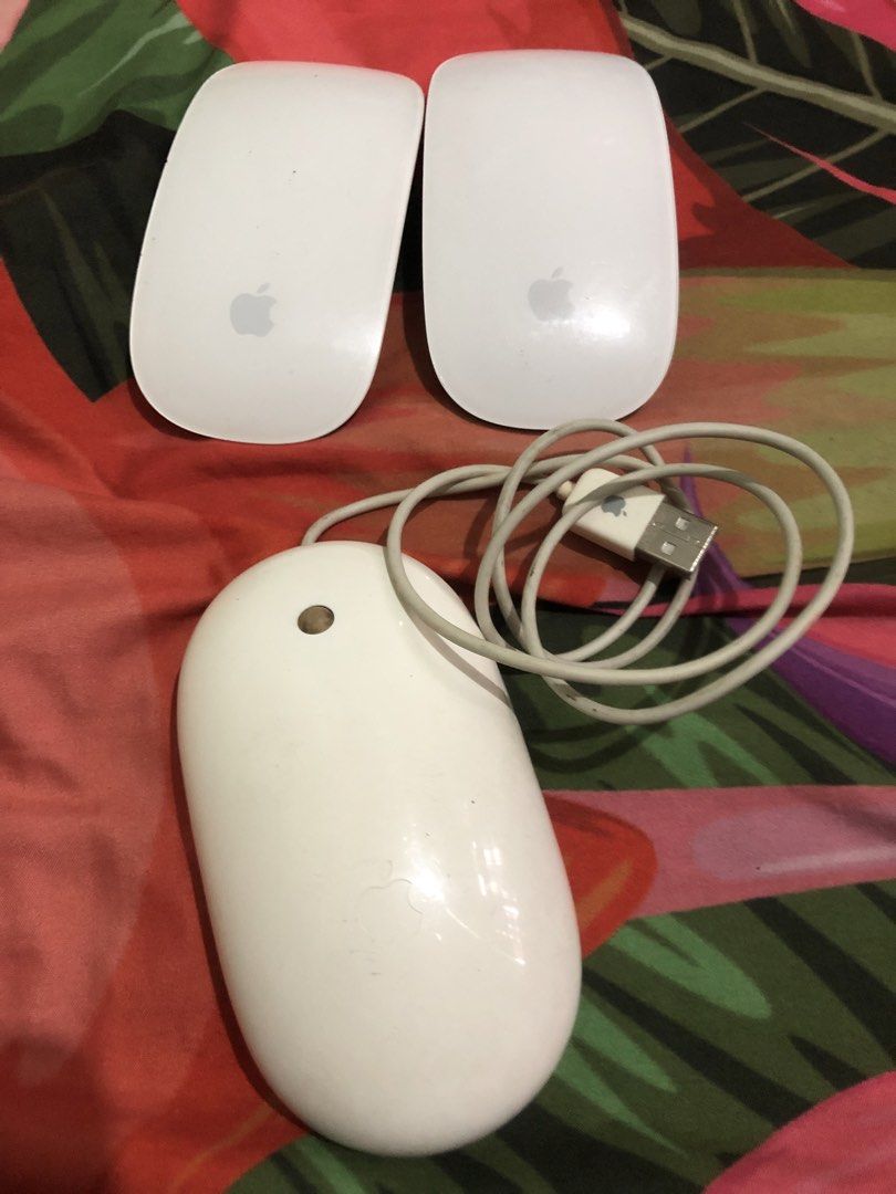 Apple wired mouse and defective magic mouse set (Category: Mouse & Mousepads) located in Quezon City. Submitted by markgolveo (Listing ID 1448944381, Image 1). Description: Apple wired mouse and defective magic mouse set Apple wired mouse tested working properly signs of wears Apple magic mouse both units defective no signs of power for parts out.
