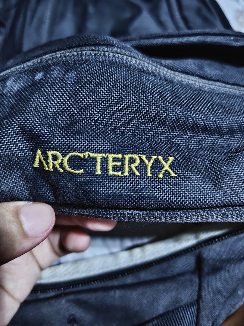 Arc'teryx Backpack Black (Category: Backpacks) located in Manila. Submitted by mysticocean-5bcd (Listing ID 1448916705, Image 3). Description: - Black Arc'teryx backpack - Features iconic logo on the front - Wide-opening main compartment with ample space - Zippers are in good working condition - Adjustable straps for a comfortable fit - Ideal for everyday use or short travel.