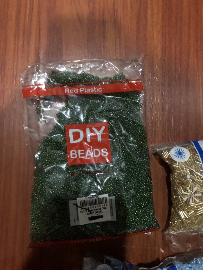 Assorted Seed Beads (BUNDLE) (Category: Craft Supplies & Tools) located in Makati City. Submitted by 4leafluckyclover (Listing ID 1449049521, Image 2). Description: Assorted Seed Beeds (Take All) - Still in packaging - Available colors: light blue, aqua blue, navy blue, gold, light green, dark green, red, and pink - dark green hasn’t been opened.