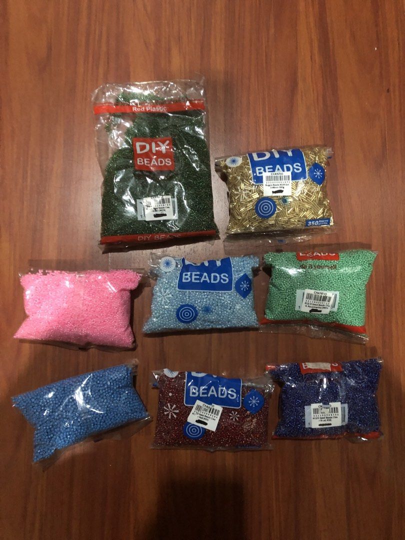 Assorted Seed Beads (BUNDLE) (Category: Craft Supplies & Tools) located in Makati City. Submitted by 4leafluckyclover (Listing ID 1449049521, Image 1). Description: Assorted Seed Beeds (Take All) - Still in packaging - Available colors: light blue, aqua blue, navy blue, gold, light green, dark green, red, and pink - dark green hasn’t been opened.