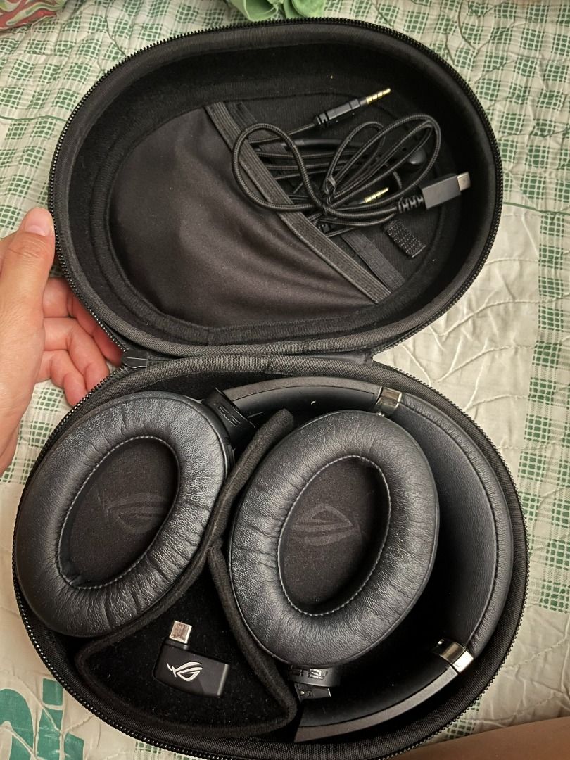 ASUS ROG Strix Go 2.4 Wireless Gaming Headset with Case (Category: Headphones & Headsets) located in Cagayan de Oro. Submitted by tintinkris (Listing ID 1449044926, Image 2). Description: - ASUS ROG Strix wireless gaming headset - Includes original hard case for protection - All cables and USB dongle included - Soft and comfortable earcups - Great for gaming and listening to music - Still in good working condition RFS: Not using it since anymore.