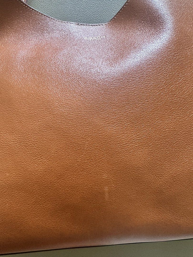 Authentic Coach Brooklyn 34 Bag in Toffee (Category: Tote Bags) located in Muntinlupa City. Submitted by DeclutterShop (Listing ID 1448972302, Image 3). Description: 💯Authentic Coach Brooklyn 34 Bag Lightly used With minimal scuffings. See pics With Receipt and Dust Bag.