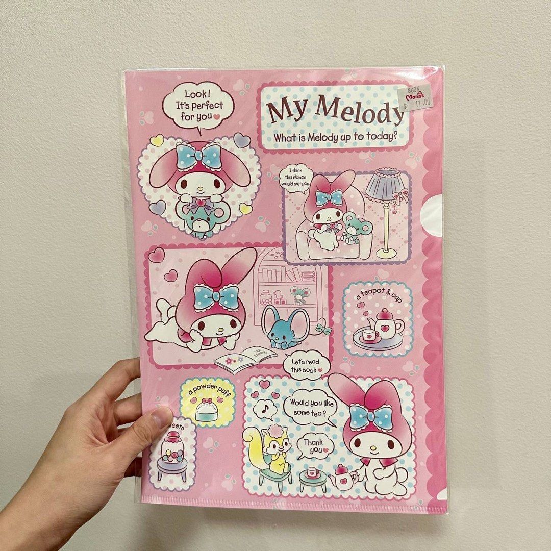 [Authentic] My Melody Cozy Room A4 Clear File Folder Sanrio Plastic Document Holder (Category: Stationery & School Supplies) located in Quezon City. Submitted by brandedusagoodies (Listing ID 1449082928, Image 1). Description: Authentic My Melody A4 clear file folder featuring a cozy room theme with Flat, teapot, books, and home décor. Perfect for organizing documents with an adorable Sanrio aesthetic. Features * Authentic Sanrio * Cozy Room Desi