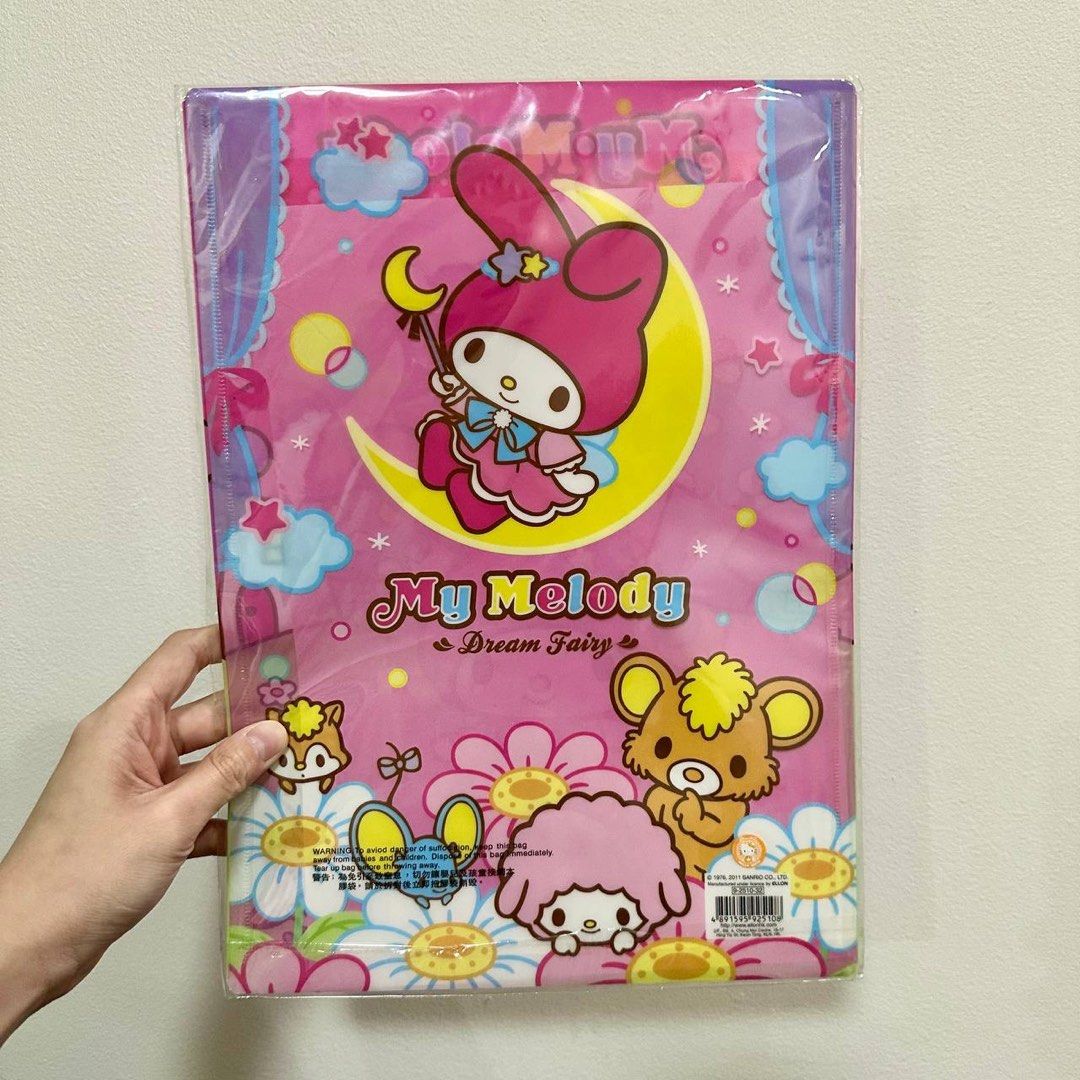 [Authentic] My Melody Dream Fairy A4 Snap Button Document Folder Sanrio Plastic File Case (Category: Stationery & School Supplies) located in Quezon City. Submitted by brandedusagoodies (Listing ID 1449080738, Image 2). Description: Authentic My Melody Dream Fairy A4 document folder featuring a magical fairy-themed design with snap button closure. Ideal for organizing documents, worksheets, certificates, notebooks, and school supplies. Features *