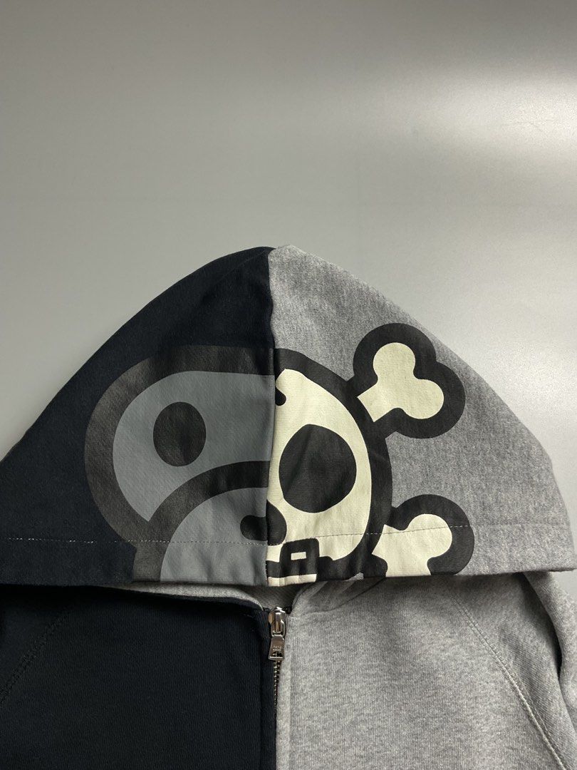 Baby Milo Skull Jacket (Category: Coats, Jackets and Outerwear) located in San Pablo. Submitted by pj_thrifthings (Listing ID 1449059106, Image 3). Description: This BAPE Baby Milo Skull Bones zip - up hoodie features a split-color design with glow-in-the-dark graphics. Authentic Guaranteed Medium Medium on tag Width - 19.5 Length - 26.5 Bnew condition Flawless Can do shipping nationwide. .