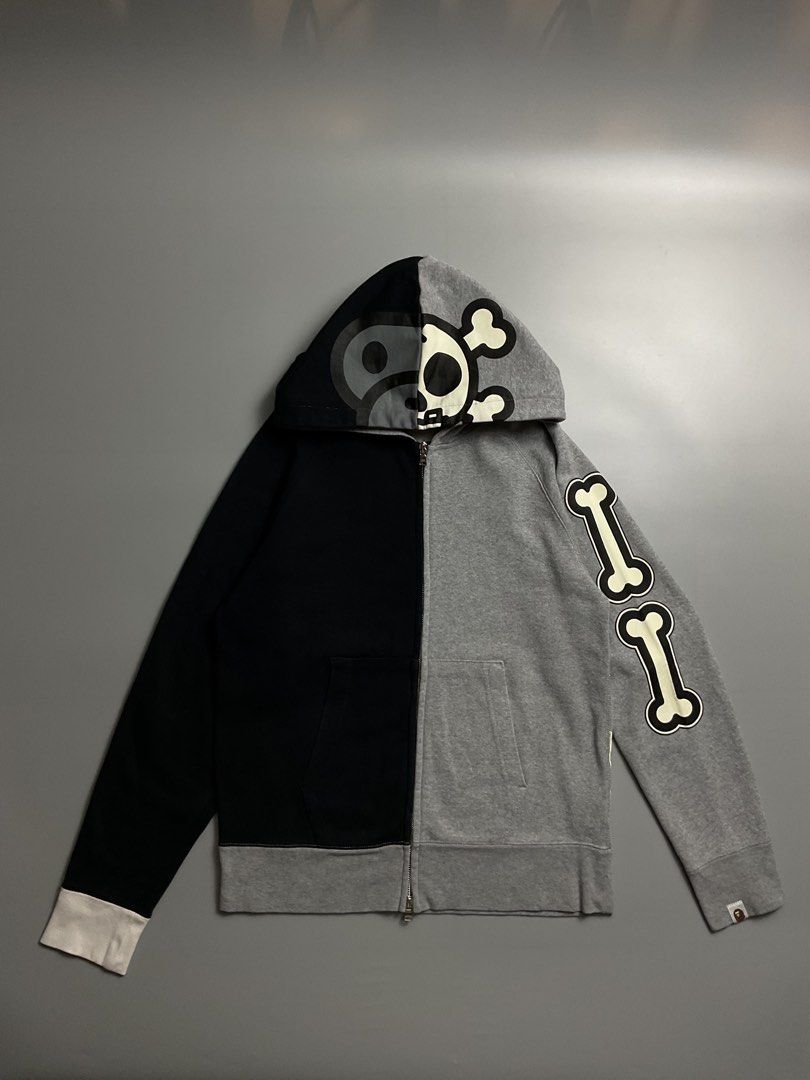 Baby Milo Skull Jacket (Category: Coats, Jackets and Outerwear) located in San Pablo. Submitted by pj_thrifthings (Listing ID 1449059106, Image 2). Description: This BAPE Baby Milo Skull Bones zip - up hoodie features a split-color design with glow-in-the-dark graphics. Authentic Guaranteed Medium Medium on tag Width - 19.5 Length - 26.5 Bnew condition Flawless Can do shipping nationwide. .