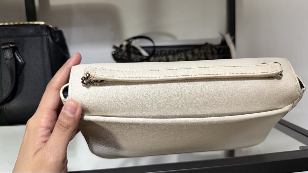 Balenciaga camera bag SHW long chain (guaranteed authentic) (Category: Luxury Bags & Wallets) located in Manila. Submitted by anne_r23 (Listing ID 1449093173, Image 2). Description: Comes with dustbag and Long Chain with some signs of usage, 8.5/10 condition well-love camera bag, with card slots inside .