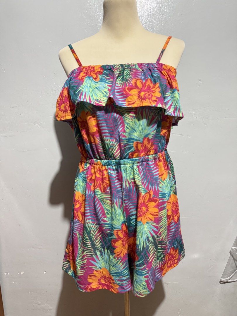 Beyou Tropical Floral Off-Shoulder Romper (Category: Rompers) located in Malabon City. Submitted by annshopable_ (Listing ID 1448962644, Image 1). Description: - Cute Beyou romper with a vibrant tropical floral print. - Stylish off-shoulder design with delicate spaghetti straps. - Comfortable elasticated waist for a perfect fit. - Ideal for beach days, casual outings, or adding a pop of color to your wardrobe. Med large.