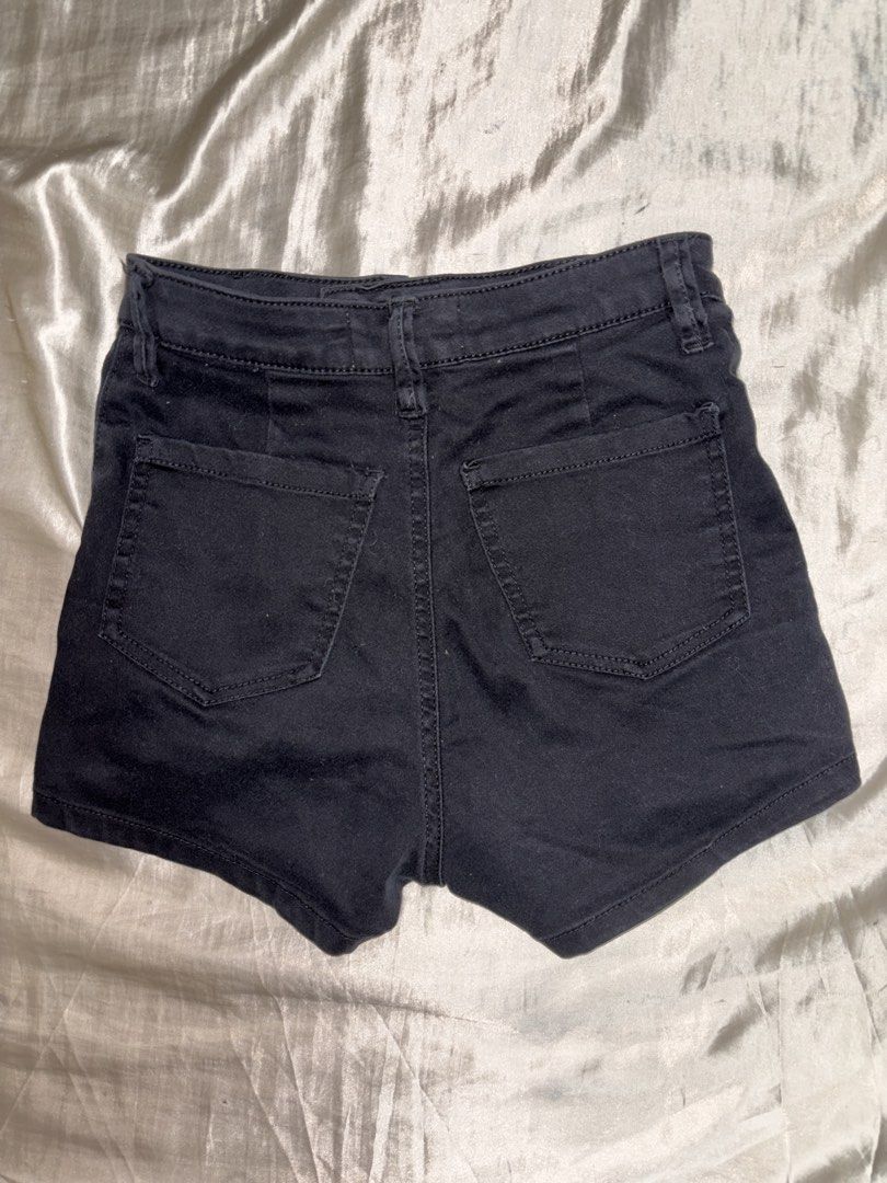Black High-Waisted Denim Shorts (Category: Shorts) located in Muntinlupa City. Submitted by aoki29 (Listing ID 1449098757, Image 2). Description: - Classic black denim shorts - High-waisted fit - Button and zip closure - Two front pockets - Two back pockets - Versatile for casual outfits.