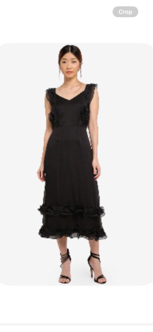 Black Midi Dress with Ruffle Details (Category: Dresses) located in Taguig. Submitted by wena11 (Listing ID 1449007991, Image 1). Description: Black Midi Dress Pleated Ruffle Trim Back zipper - Elegant black midi dress - Features delicate ruffled straps - Tiered ruffles at the hem for added flair - Flattering V-neckline - Convenient back zipper closure - Ideal for evening events or special occasions - Combines comfort and style Size: Small Length