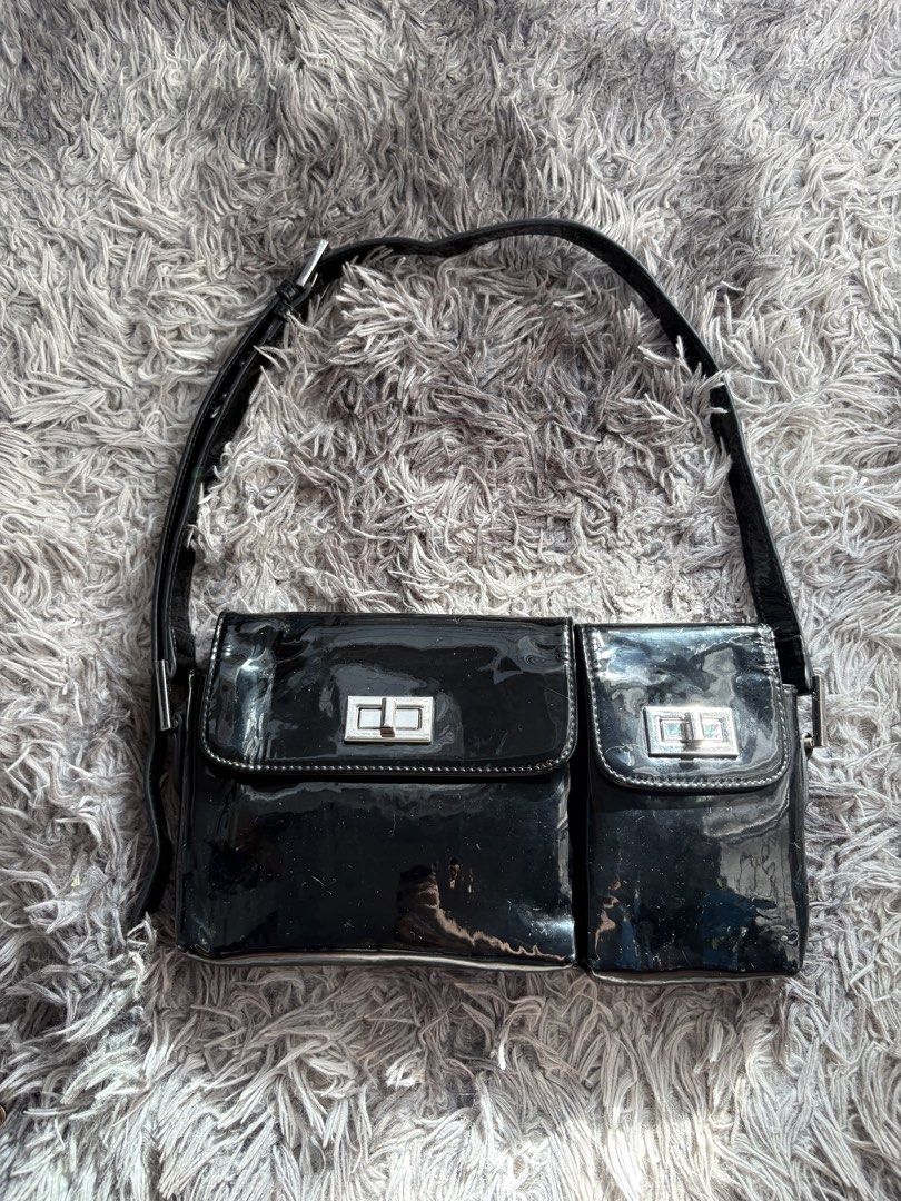 Black Patent Double-Pocket Shoulder Bag (Category: Shoulder Bags) located in Davao. Submitted by sweetlex (Listing ID 1449058389, Image 1). Description: Selling my preloved black patent shoulder bag. It has a glossy finish, two front pockets with turn-lock closures, and an adjustable strap. It’s a simple and versatile bag that’s easy to pair with any outfit. Condition: • Normal signs of use Please check all photos for the actual condition. 📍 San
