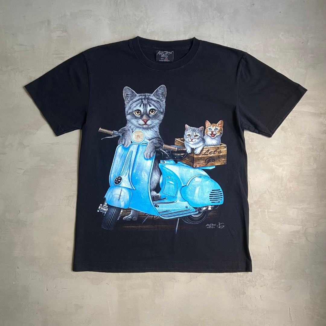 Black Shirt with Cute Cat Graphic Print (Category: Shirts) located in Pasig City. Submitted by precycled_ (Listing ID 1448963559, Image 1). Description: Code : Black Shirt with Cute Cat Graphic Print Size : M - 26 inches L x 19.5 inches W Condition : 9.5/10 Price : 399 php Issue : Hairline . . . ‼️BUY AT YOUR OWN RISK ❗Payment First Basis 📌Be 100% SURE before submitting the form 📌1 DAY Reservation ONLY! ❌No Pick-up / No Meet up ❌No RETURN / EXC