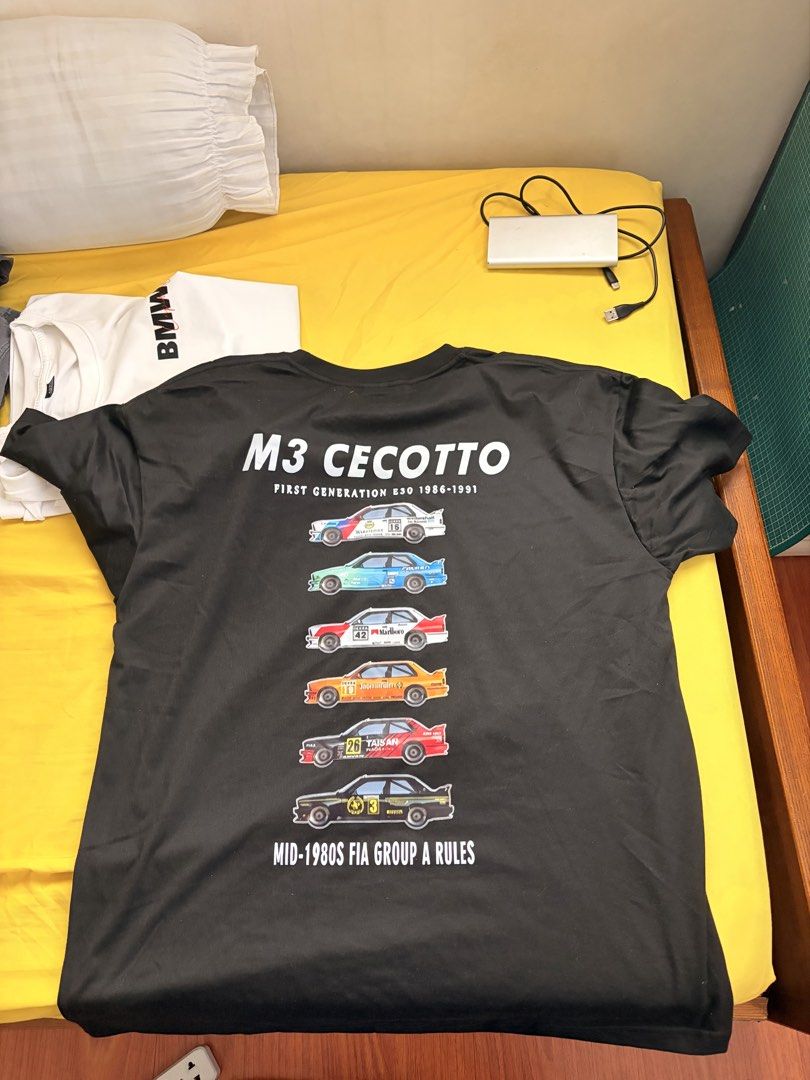 BMW M3 Cecotto & M5 T-Shirts (Category: Tshirts & Polo Shirts ) located in Binan City. Submitted by spec.a (Listing ID 1448903083, Image 2). Description: - Bundle Deal: Get both graphic tees! - Black Tee: Features the iconic first-generation BMW M3 Cecotto (1986-1991) with dynamic race car illustrations. - White Tee: Showcases cool BMW M5 graphics and detailed schematics. - Perfect for any BMW or car enthusiast. - Both are comfortable, short-slee