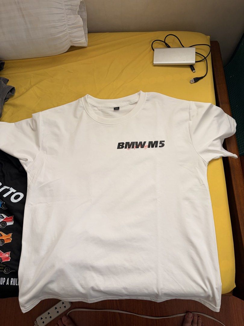 BMW M3 Cecotto & M5 T-Shirts (Category: Tshirts & Polo Shirts ) located in Binan City. Submitted by spec.a (Listing ID 1448903083, Image 3). Description: - Bundle Deal: Get both graphic tees! - Black Tee: Features the iconic first-generation BMW M3 Cecotto (1986-1991) with dynamic race car illustrations. - White Tee: Showcases cool BMW M5 graphics and detailed schematics. - Perfect for any BMW or car enthusiast. - Both are comfortable, short-slee