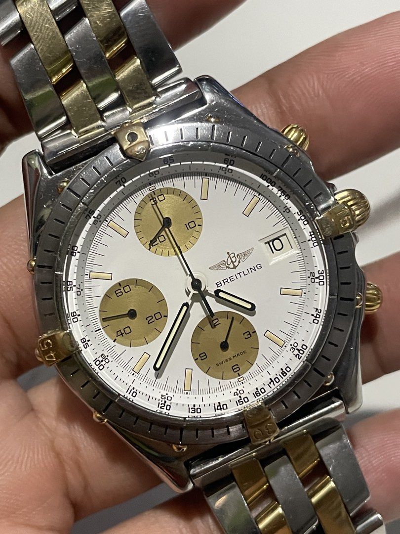 Breitling Chronograph Two-Tone (Category: Luxury Watches) located in Taguig. Submitted by j_watches007 (Listing ID 1449076660, Image 3). Description: - Breitling Chronograph Watch - Swiss Made -81.950 -28689 - White dial with elegant gold threes sub-dials and accents - Stainless steel and gold two-tone bracelet - Convenient date window at 3 o'clock - Functional chronograph complication - Authentic Swiss Made craftsmanship - Ideal addition for any