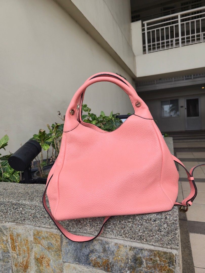 Bruno Magli Leather Bag with Gold Hardware (Category: Shoulder Bags) located in Manila. Submitted by maizdlm (Listing ID 1448924195, Image 3). Description: - Get any of the free items from my account when you get this bag - Cute pink hobo or sling bag - Leather material - Detachable strap for crossbody wear - Multiple interior pockets for organization - Gold hardware details - Great everyday bag.