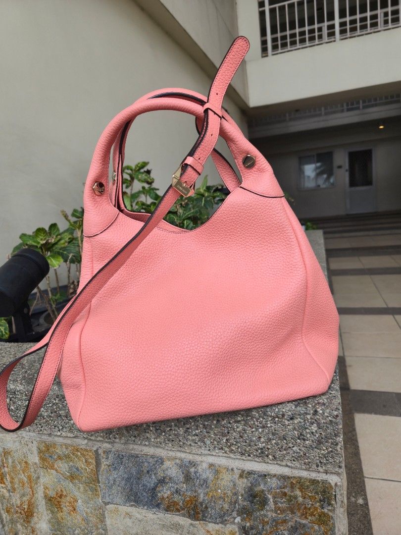 Bruno Magli Leather Bag with Gold Hardware (Category: Shoulder Bags) located in Manila. Submitted by maizdlm (Listing ID 1448924195, Image 2). Description: - Get any of the free items from my account when you get this bag - Cute pink hobo or sling bag - Leather material - Detachable strap for crossbody wear - Multiple interior pockets for organization - Gold hardware details - Great everyday bag.